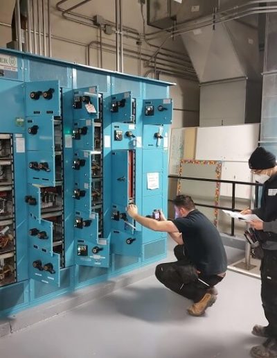 Electricians performing infrared electrical inspection